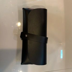 Women’s Black Sunglasses w/soft vinyl case.